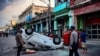 Una patrulla volteada por los manifestantes el 11 de julio, en La Habana. (Yamil Lage/AFP),